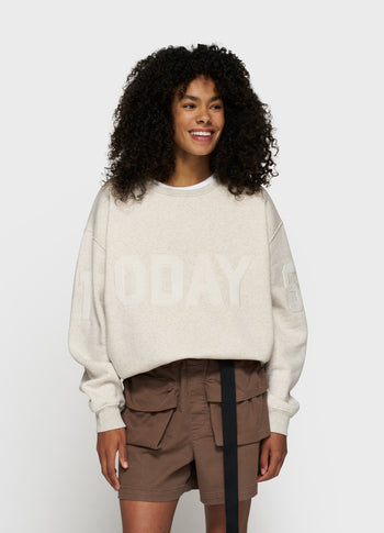 statement sweater logo patch | soft white melee