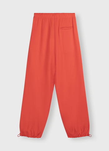 parachute pants | poppy red