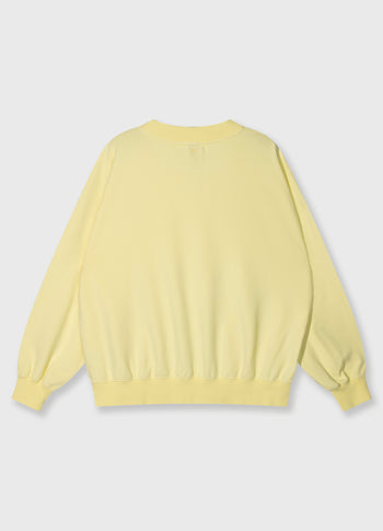oversized sweater logo | pastel yellow