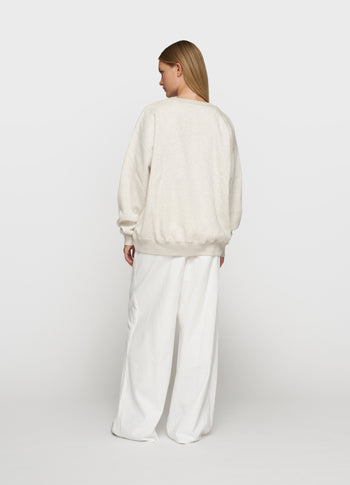 THE STATEMENT SWEATER | soft white melee