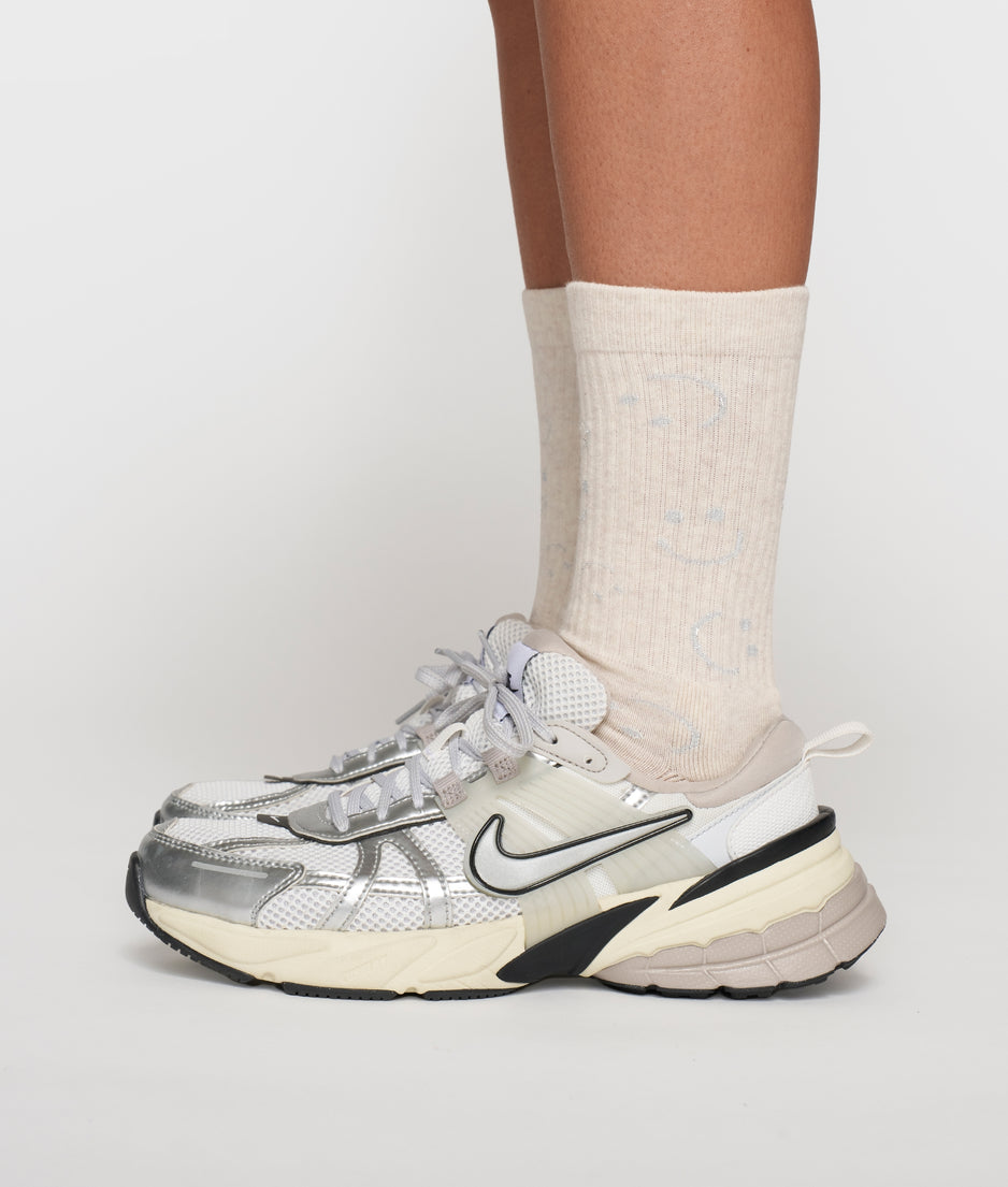 socks all-over smile | soft white melee