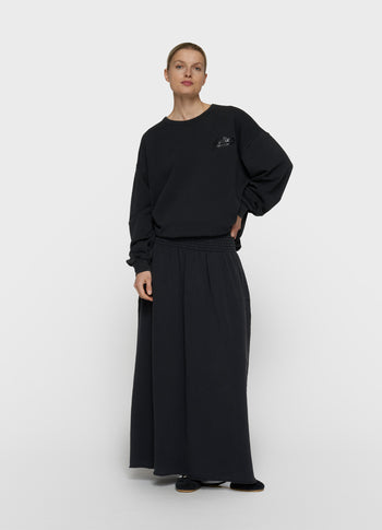 statement sweater believe | dark charcoal