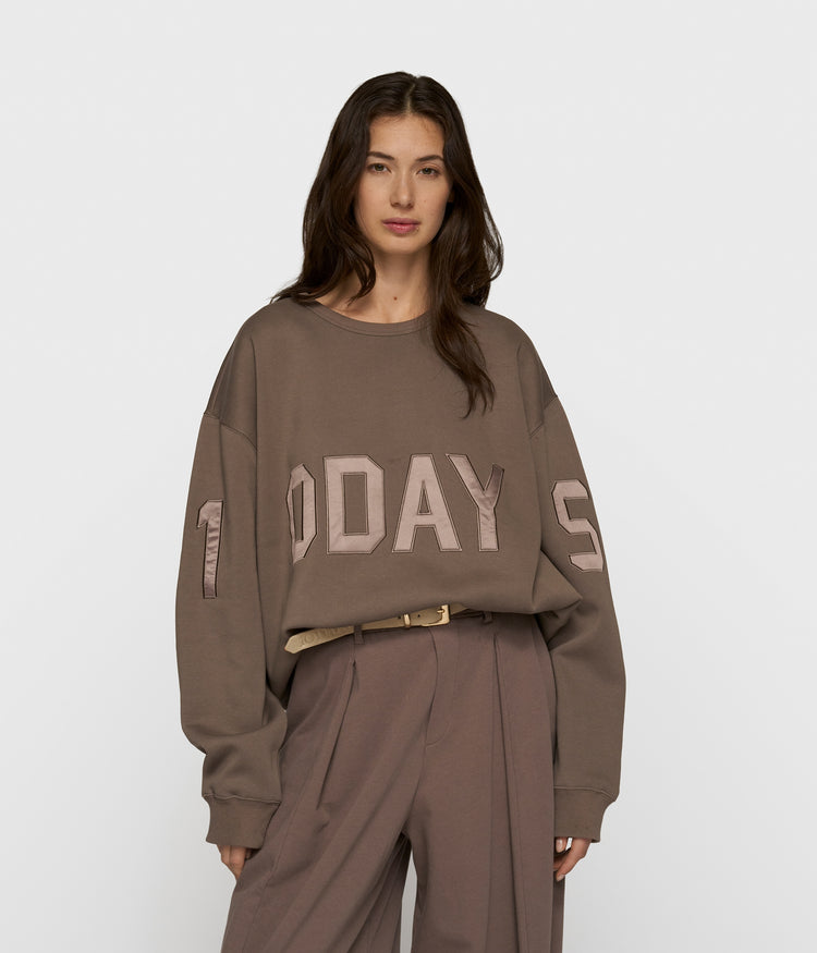 statement sweater logo | moonrock