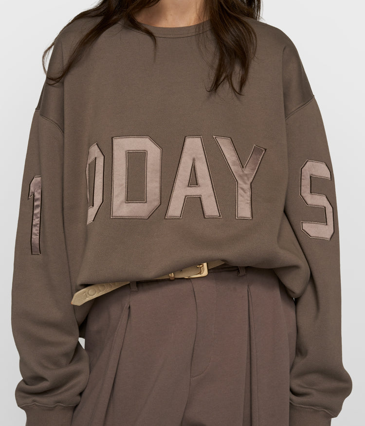 statement sweater logo | moonrock