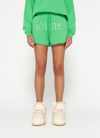 beach shorts logo | apple green