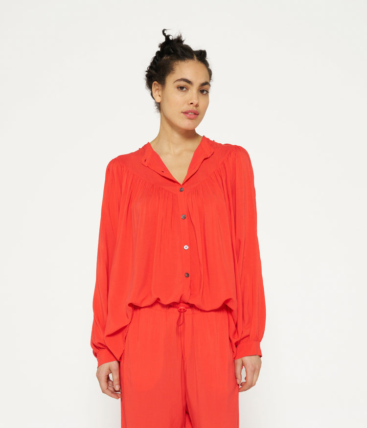 flowy pleated blouse | poppy red