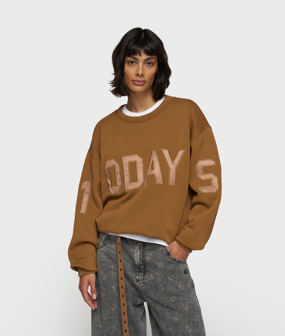 statement sweater logo | suede