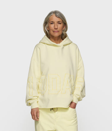 statement logo hoodie | pastel yellow