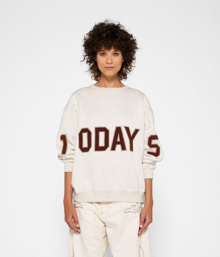 statement sweater logo | soft white melee