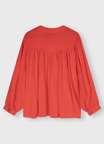 flowy pleated blouse | poppy red