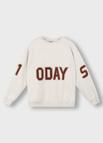 statement sweater logo | soft white melee