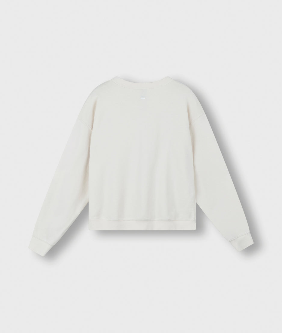 sweater tagline | cream