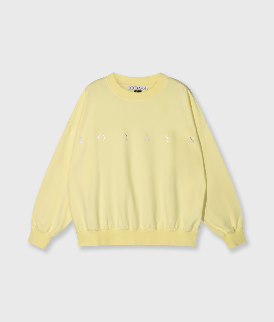 oversized sweater logo | pastel yellow