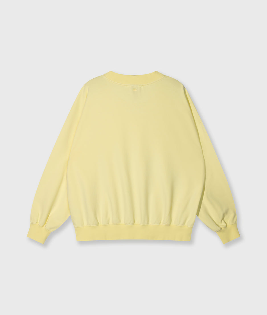 oversized sweater logo | pastel yellow