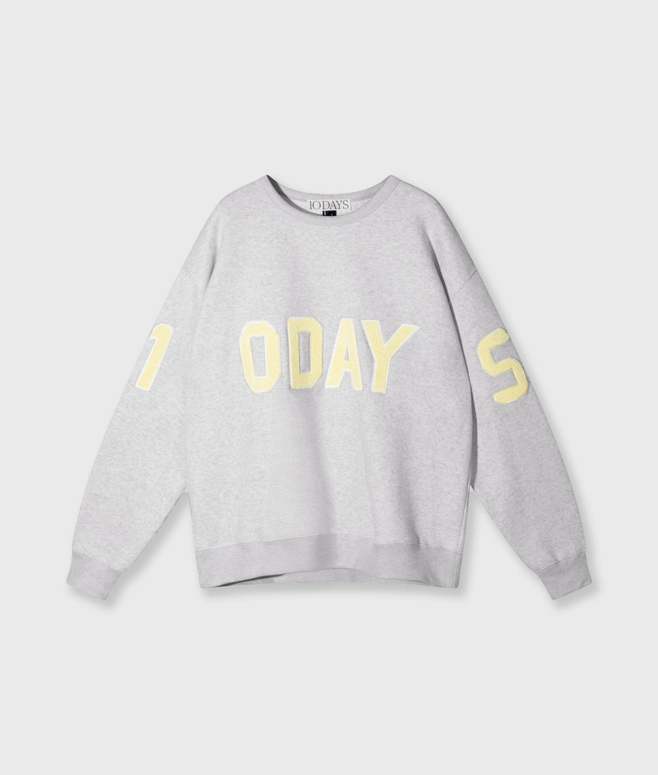 statement sweater logo patch | white grey melee