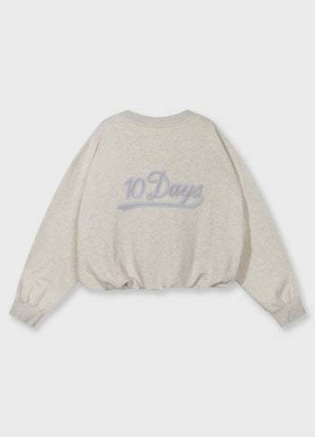 geplooide 10DAYS sweater | soft white melee