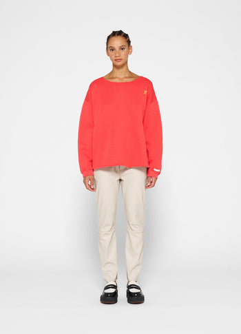 raw edge statement sweater | coral red