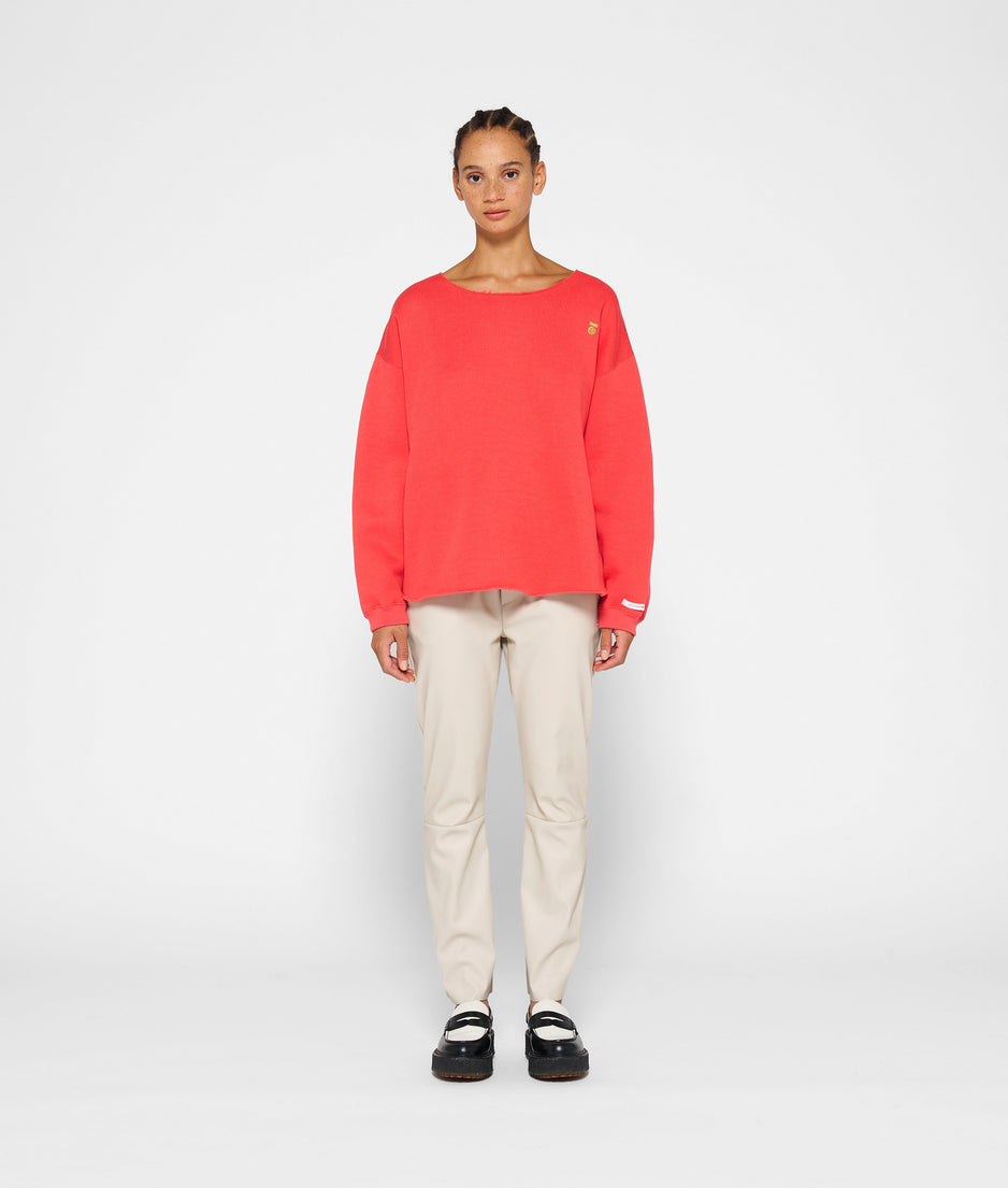 raw edge statement sweater | coral red