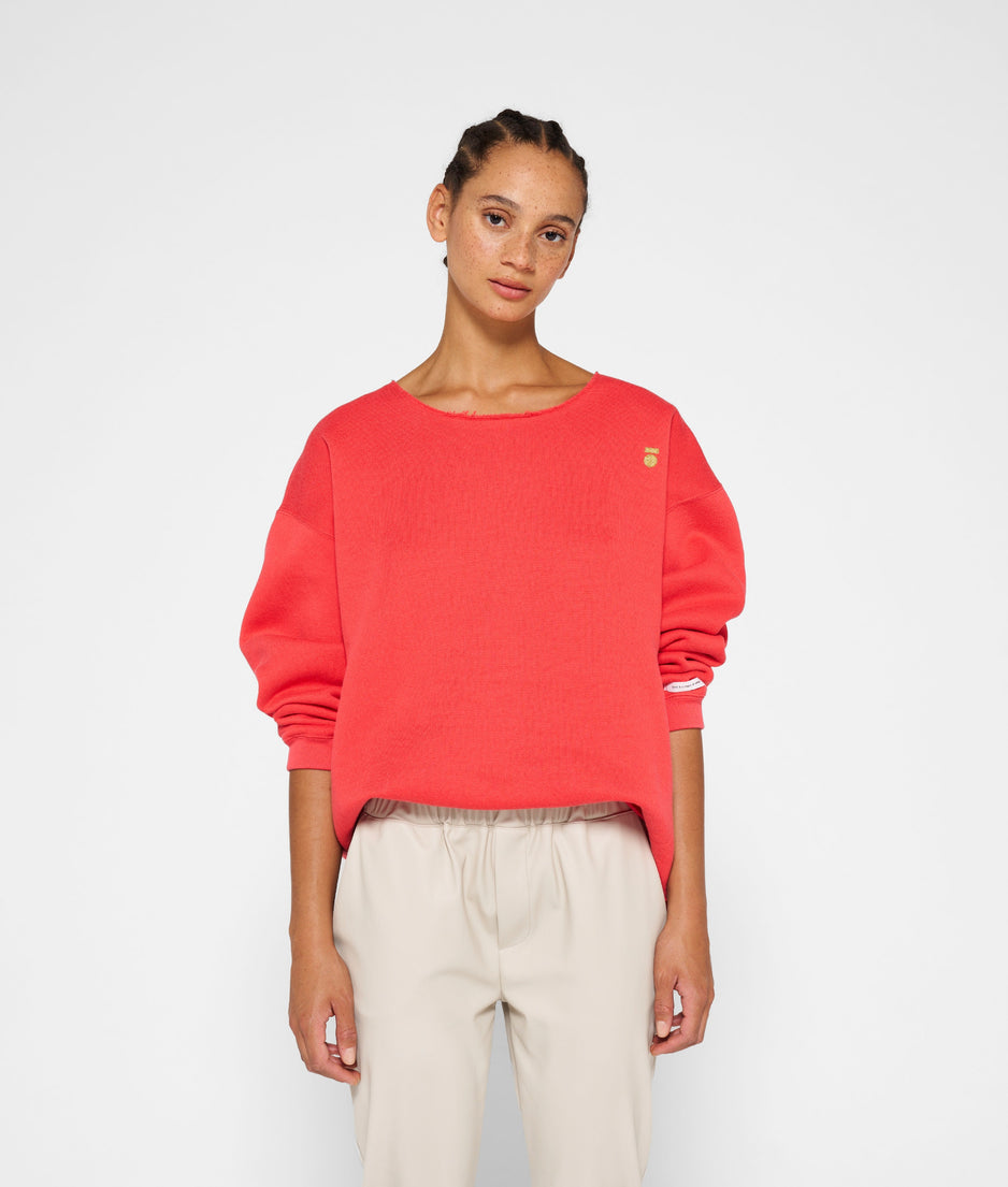 raw edge statement sweater | coral red