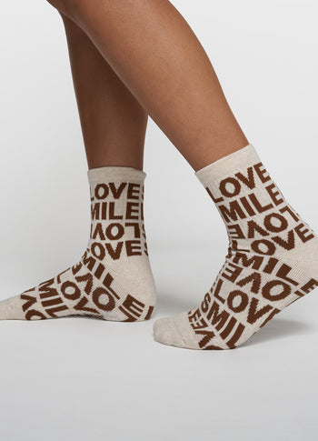 socks all-over smile love | soft white melee